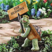turtle holding sign